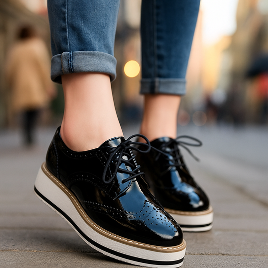 Stylish women's oxford platform shoes, comfortable for everyday wear. Features a fashionable perforated design.