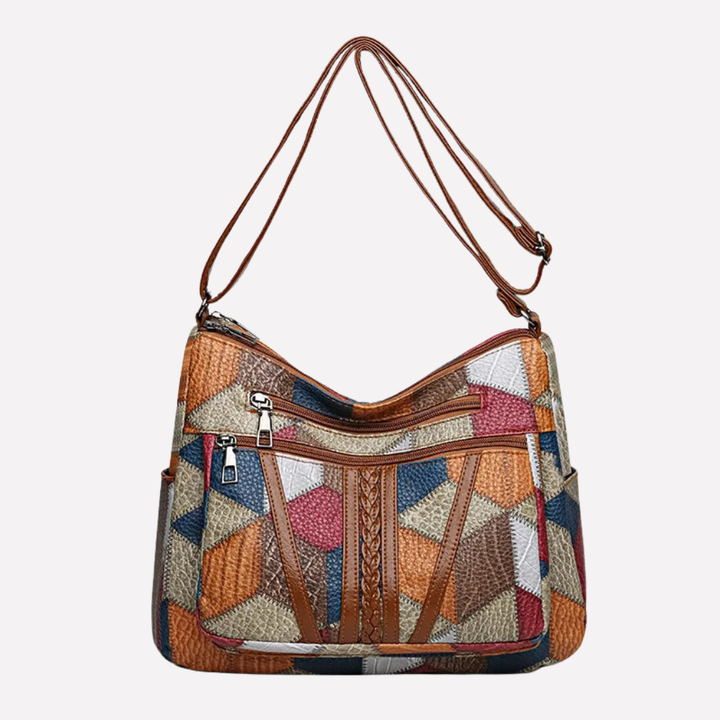 Stylish women's patchwork shoulder bag with elegant braided detail, a versatile fashion accessory for everyday carry.