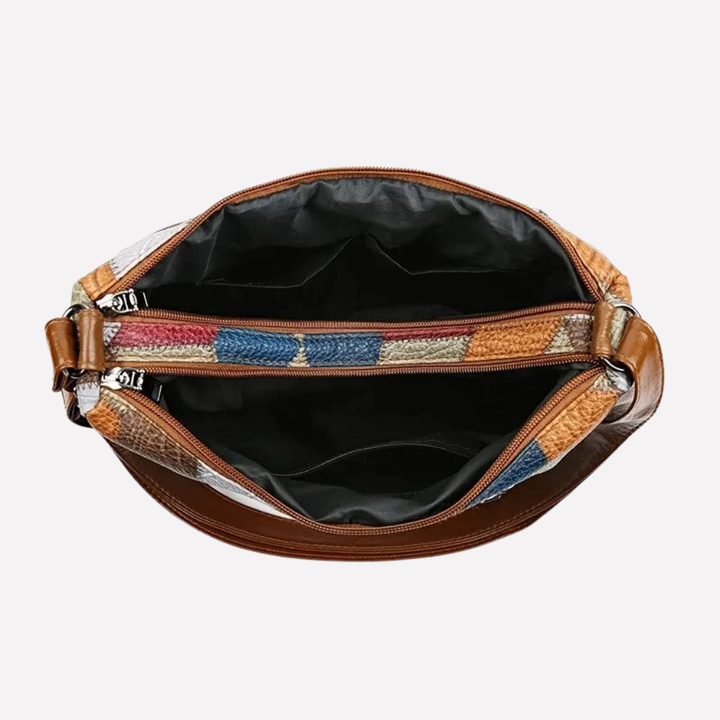 Fashionable women's shoulder bag with eye-catching patchwork and braided elements, ideal as a stylish everyday tote.