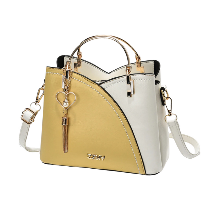 Modern women's patchwork tote, versatile as a shoulder bag or handbag. Features a stylish tassel charm. New.