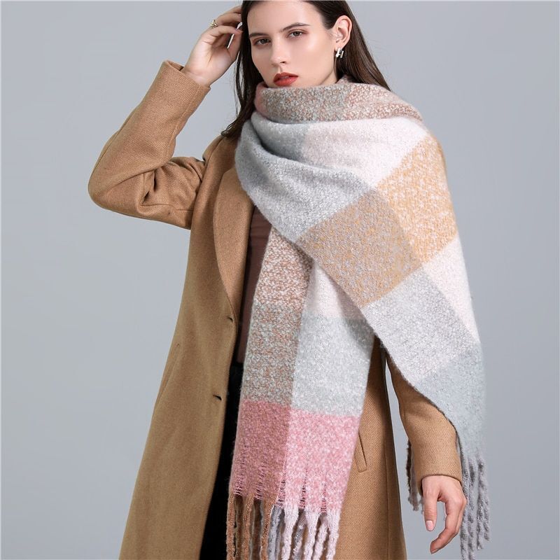 Warm & stylish women's plaid scarf, a must-have winter fashion accessory.