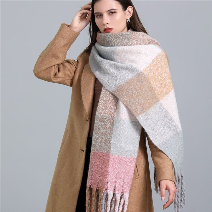 Warm & stylish women's plaid scarf, a must-have winter fashion accessory.