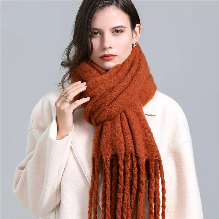 Cozy plaid winter scarf for women, stylish and warm fashion accessory.