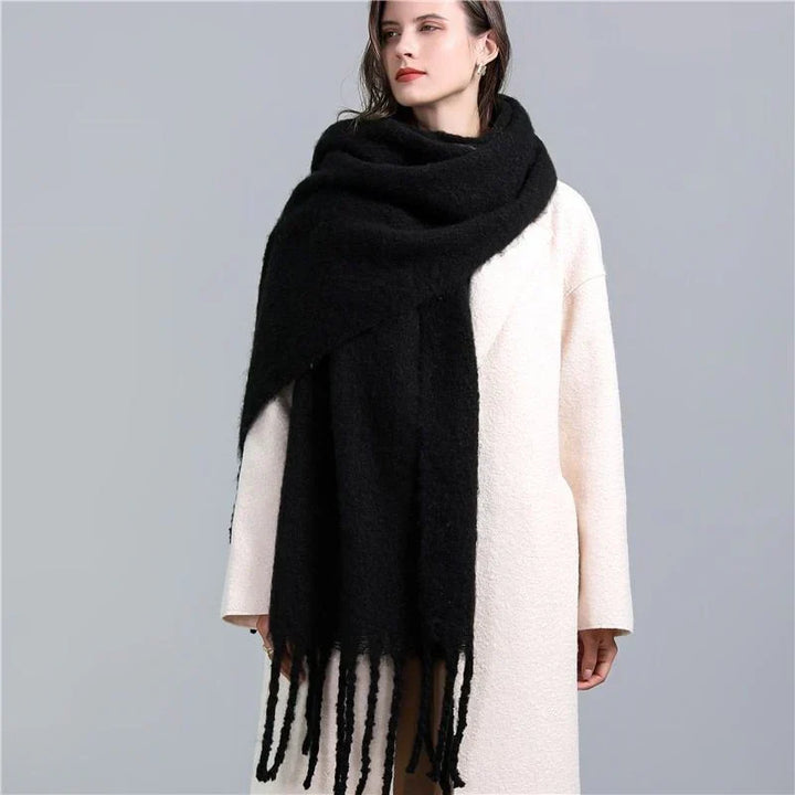 Fashionable women's winter plaid scarf, soft and warm for cold days.