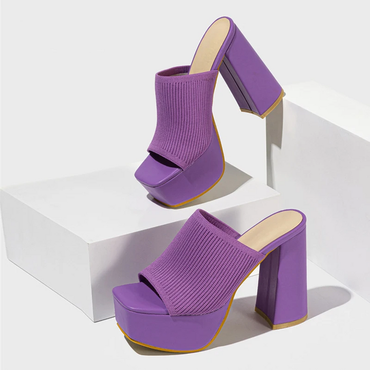 Fashionable women's platform sandals providing elevated comfort and a stylish boost to any summer ensemble.