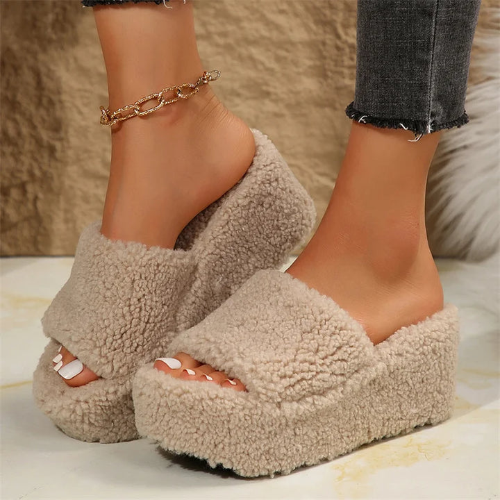 Elegant women's platform wedge sandals. Summer open-toe footwear providing stylish elevated comfort and height.