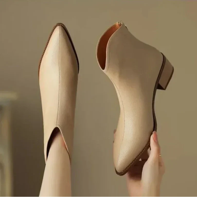 Sleek pointed toe ankle boots, women's heeled design for a modern, fashionable look.