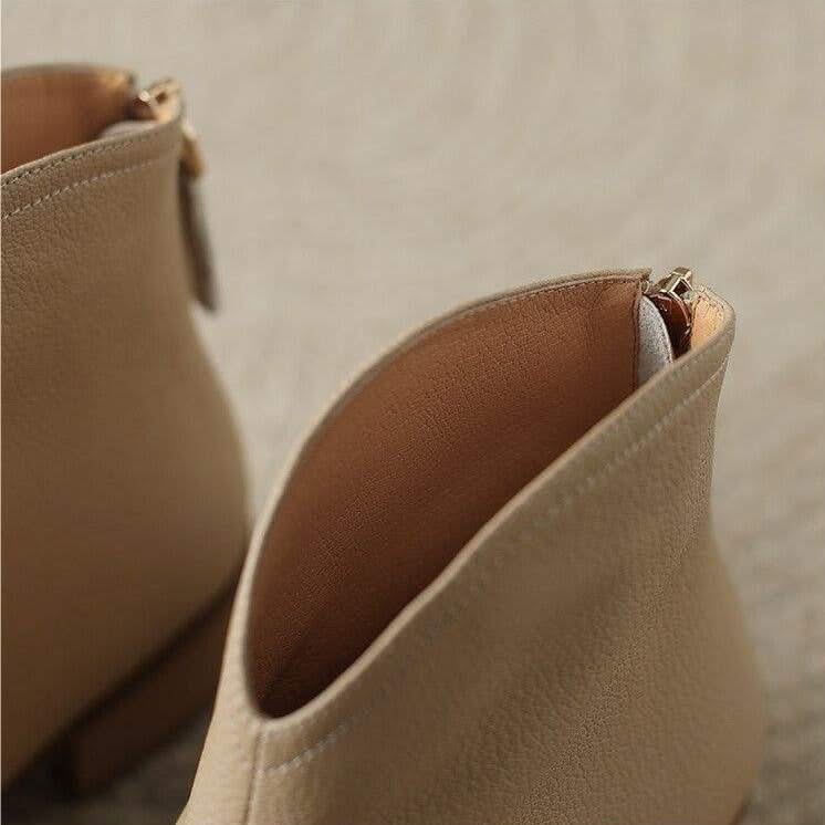 Women's fashionable pointed toe ankle boots with a heel, designed for comfort and style.