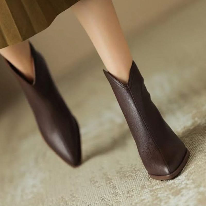 Chic beige pointed toe ankle boots for women, comfortable and perfect for versatile styling.