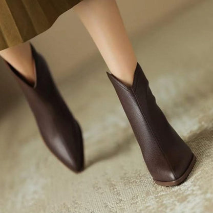 Chic beige pointed toe ankle boots for women, comfortable and perfect for versatile styling.