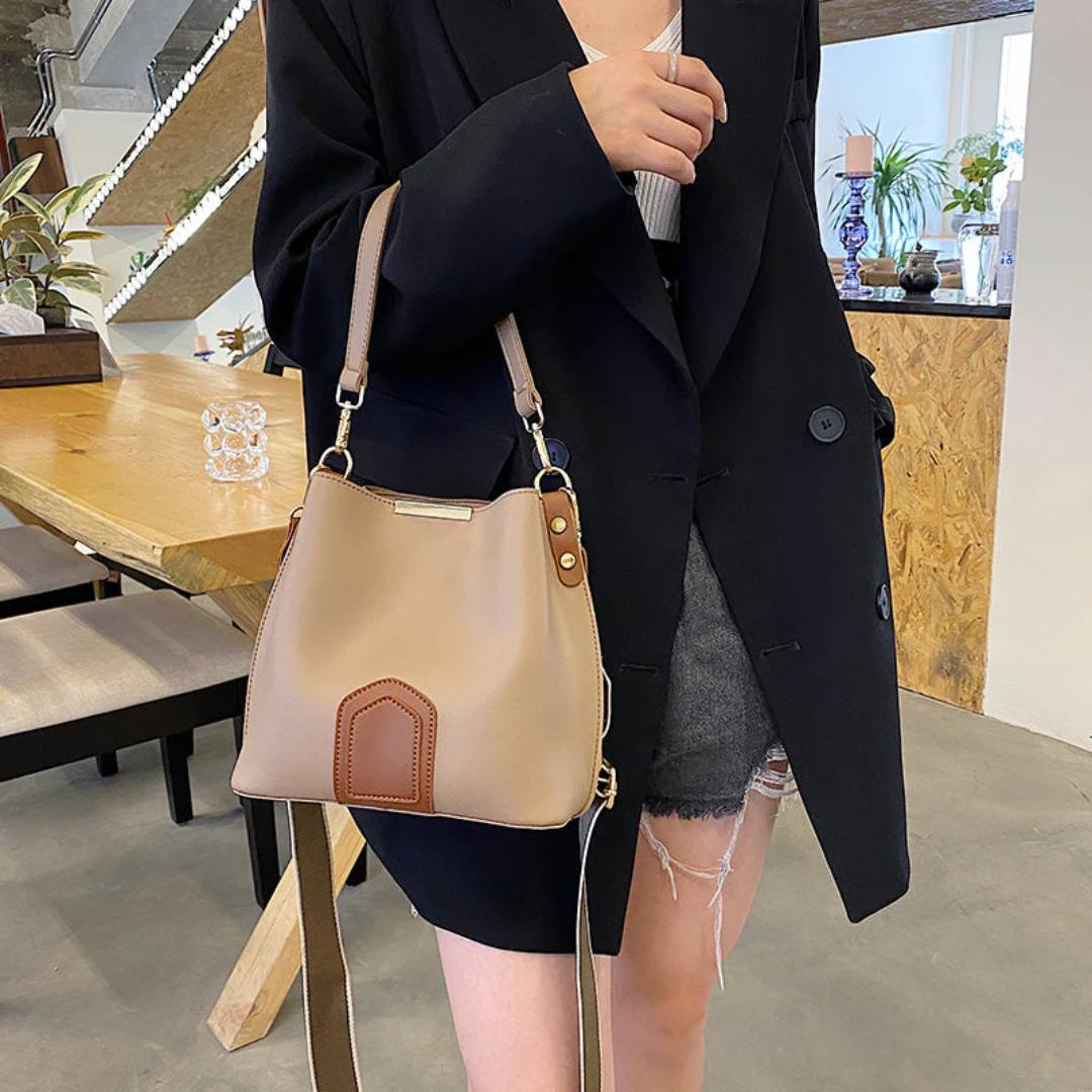 Chic women's premium leather shoulder bag, a sophisticated daily handbag and fashion accessory.