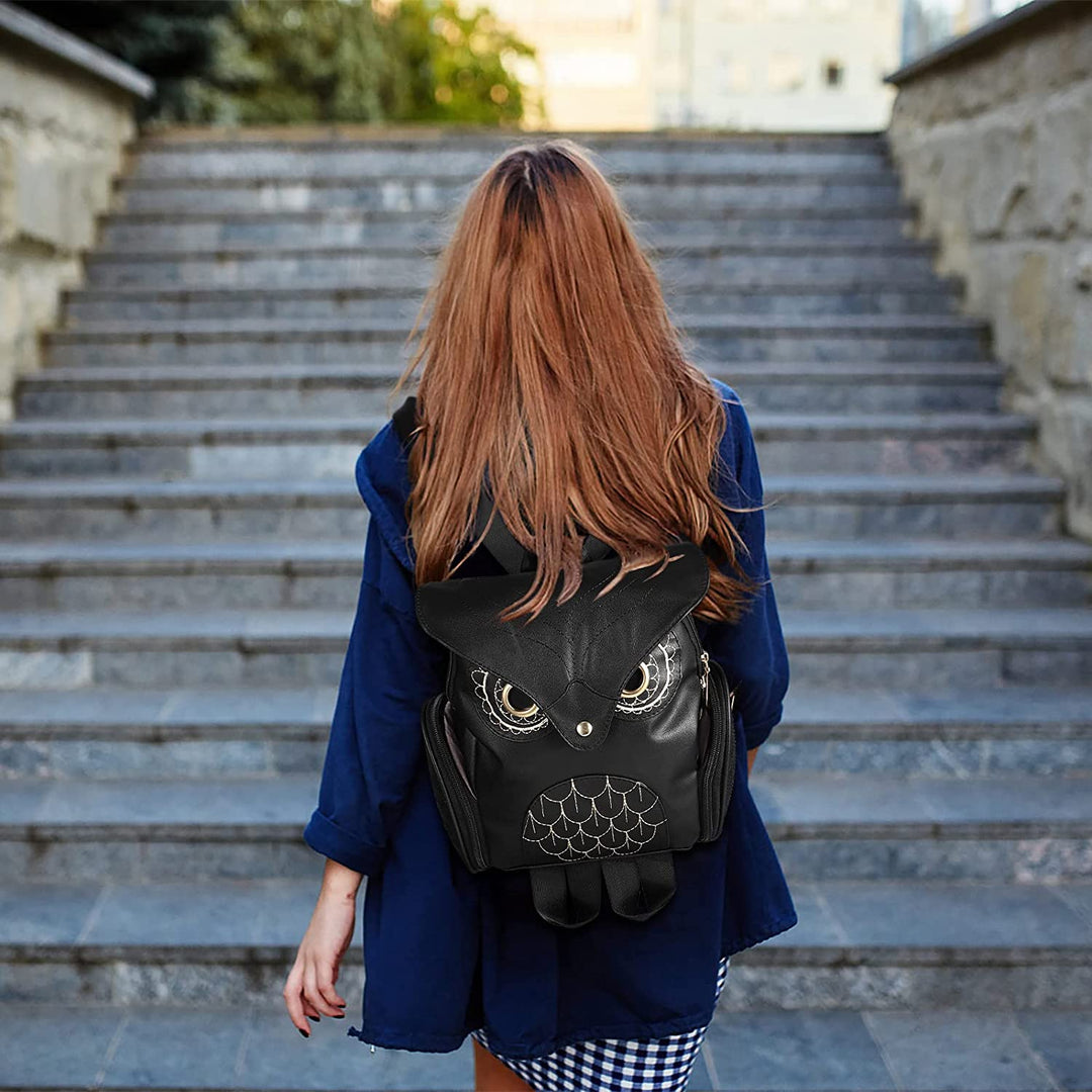 Women's PU leather school bag with a cute owl print, ideal for carrying essentials in style.