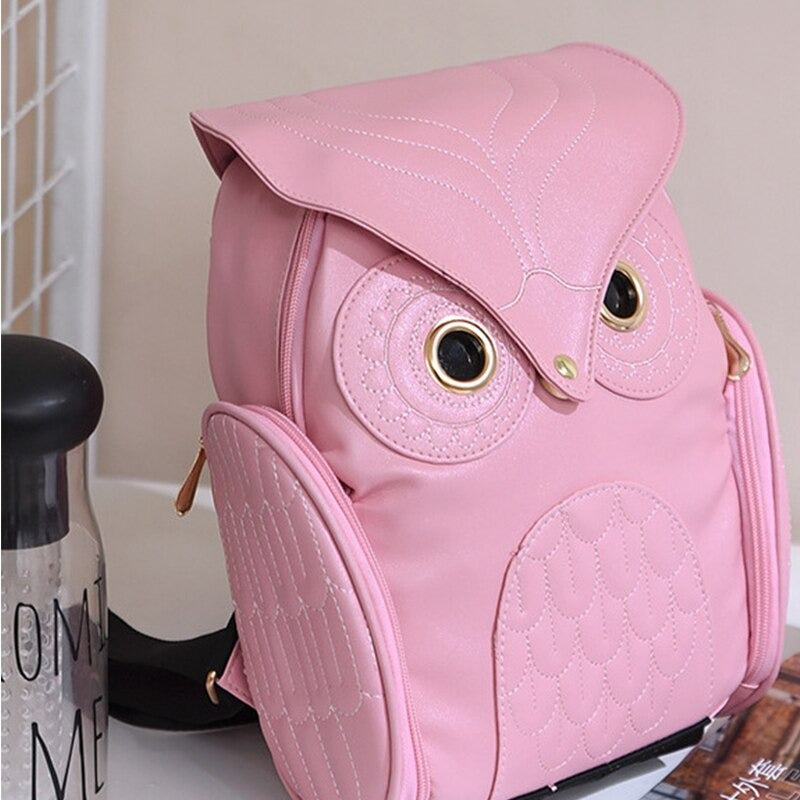 Elegant women's accessory: an owl print PU leather backpack with ample storage pockets.