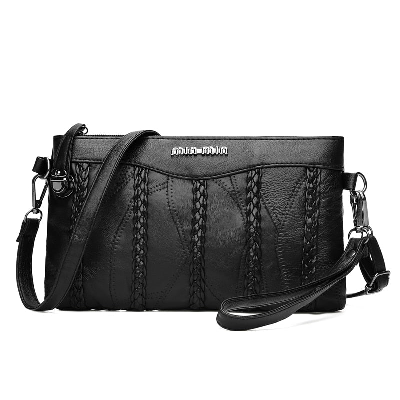 Stylish women's PU leather crossbody clutch bag. Versatile design for elegant daily or evening carry.
