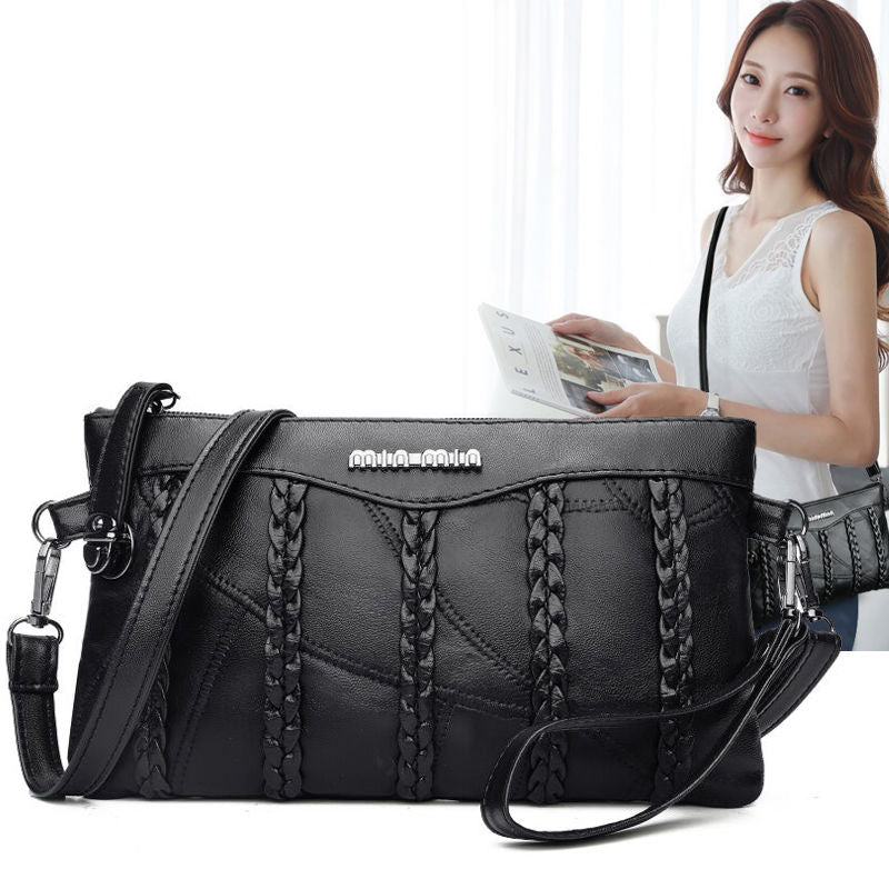 Modern PU leather women's crossbody clutch with spacious interior for organized daily essentials.