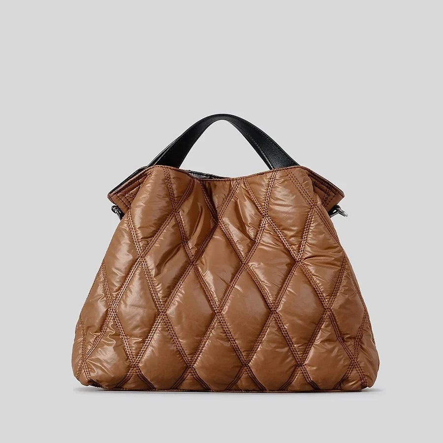 Luxury cotton-filled quilted tote bag for women. Spacious, comfortable, and stylish for everyday fashion.