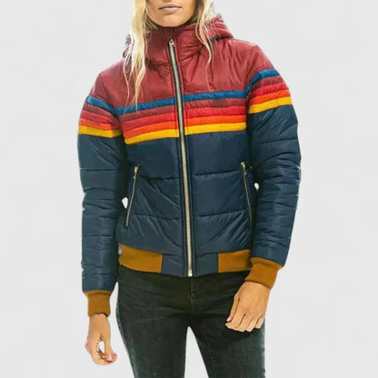 Close-up of a women's retro stripe winter jacket. Features warm padding, ideal for stylish cold weather outfits.