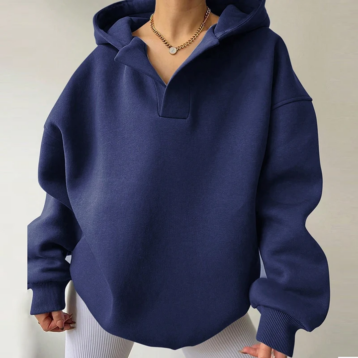 Soft, cozy women's oversized V-neck hoodie. Perfect relaxed fit pullover for loungewear or casual comfort.
