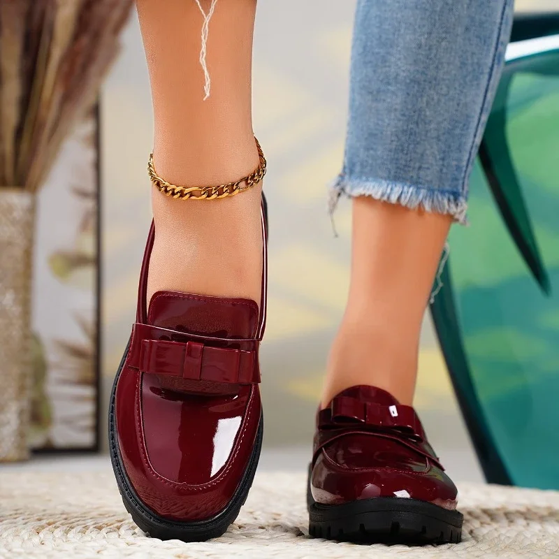 Comfortable women's chunky sole loafers, featuring a chic bow and easy slip-on design for everyday style.