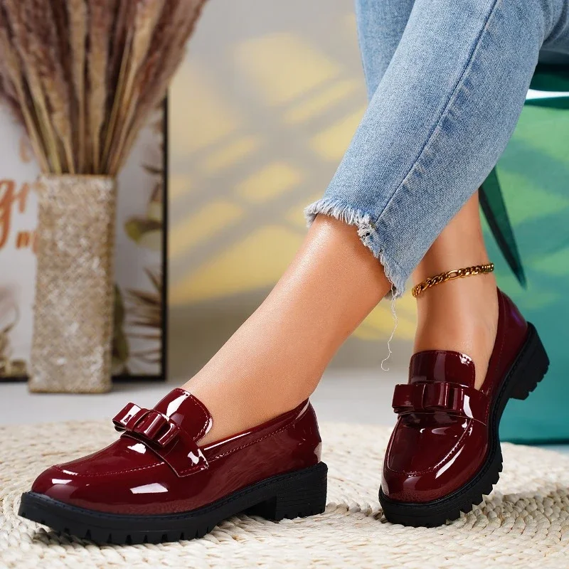 Versatile women's chunky bow loafers, ideal as stylish slip-on dress shoes or comfortable casual footwear.