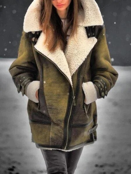 Stylish women's suede Sherpa winter jacket. Warm, chic outerwear for ultimate comfort in fall and winter fashion.
