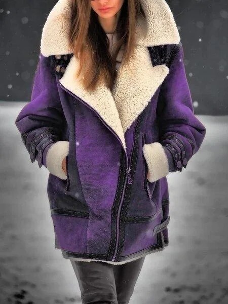 Chic women's long-sleeve suede winter jacket, featuring plush Sherpa for warmth, comfort & seasonal style.