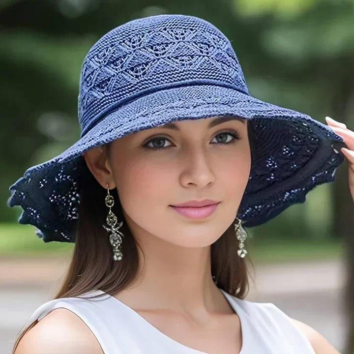 Foldable, adjustable women's sun hat with elegant lace and wide brim for stylish beach days.
