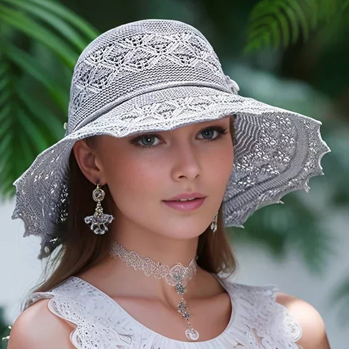 Summer beach sun hat for women, stylish wide brim with elegant lace, offering great protection.
