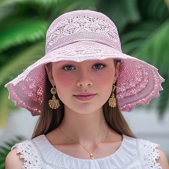Chic women's sun hat, wide brim with delicate lace, foldable design for travel and style.