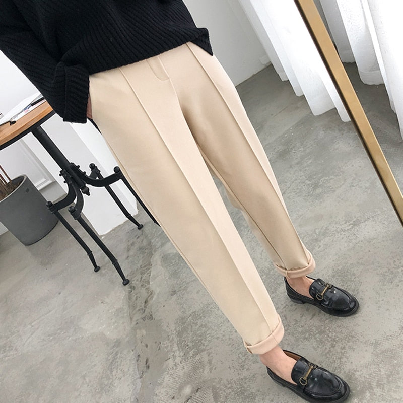 Comfortable ladies' thickened casual pants for versatile cool weather fashion and warmth.