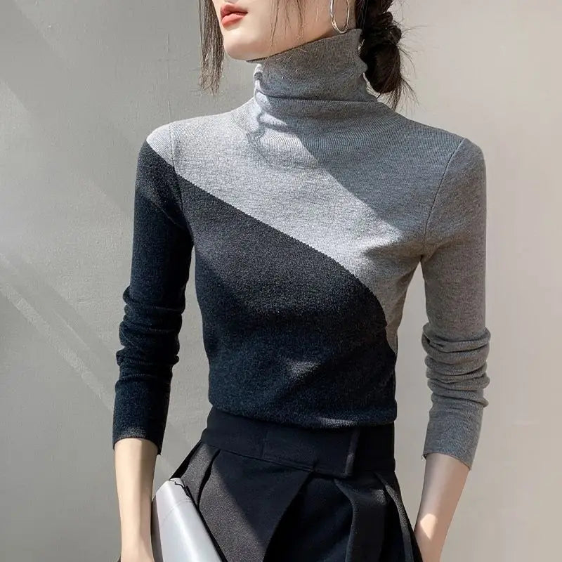 Fashionable women's two-tone split sweater, a chic khaki & gray long-sleeve knit top for modern fall & winter style.