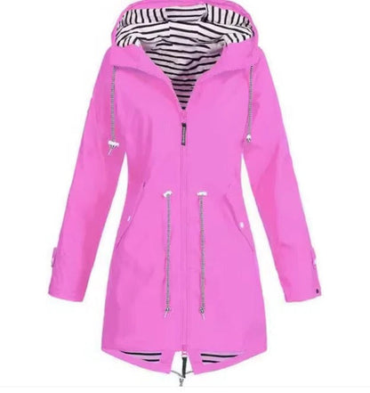 Close-up of a women's sleek waterproof hooded jacket, highlighting its durable fabric & stylish design for weather protection.