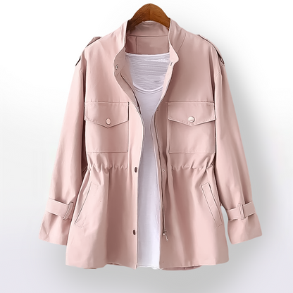Fashionable women's waterproof raincoat, all-weather chic outerwear with a flattering cinched waist.