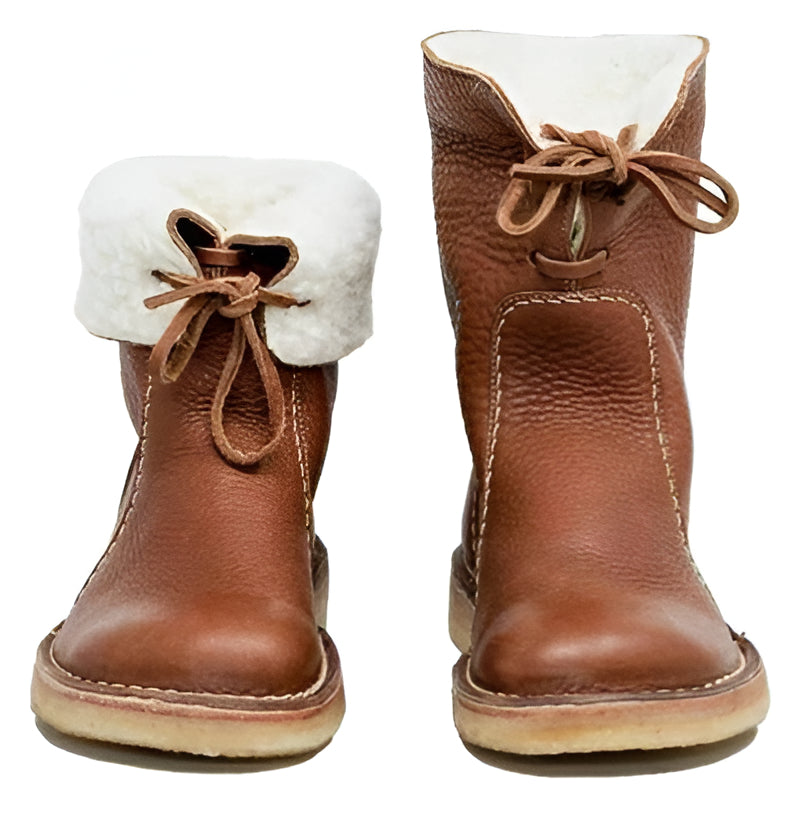 Warm women's lace-up winter boots, wool-lined for ultimate comfort. Stylish and durable, perfect for chilly everyday adventures.