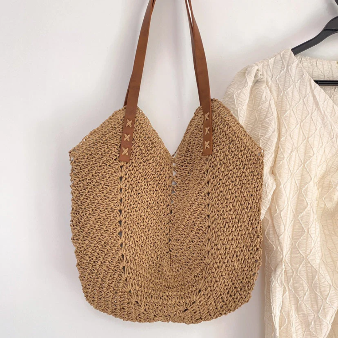 Stylish women's woven shoulder bag in white and brown, perfect for versatile casual wear.