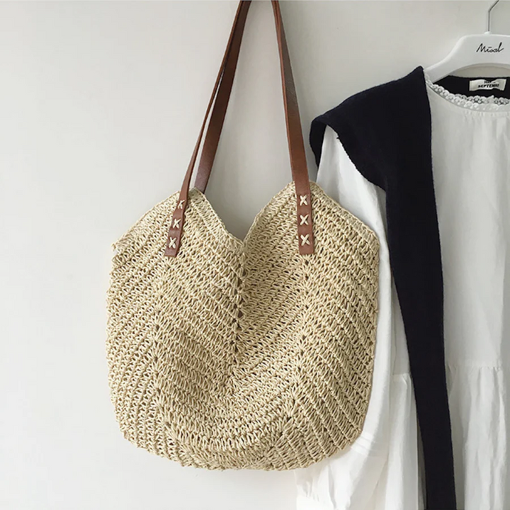 Women's stylish woven shoulder bag, a versatile white & brown handbag accessory for casual outfits.