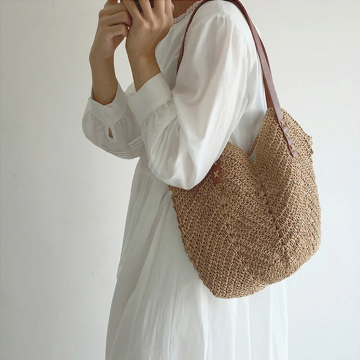 Textured white & brown woven shoulder bag, a stylish women's accessory for a casual and versatile handbag.