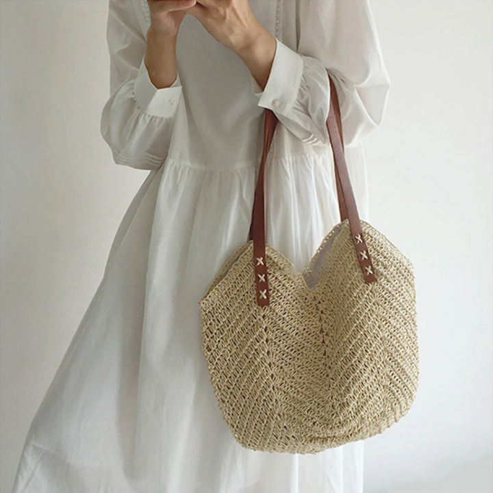 Modern women's woven shoulder bag in white & brown, a versatile, casual handbag and stylish accessory.
