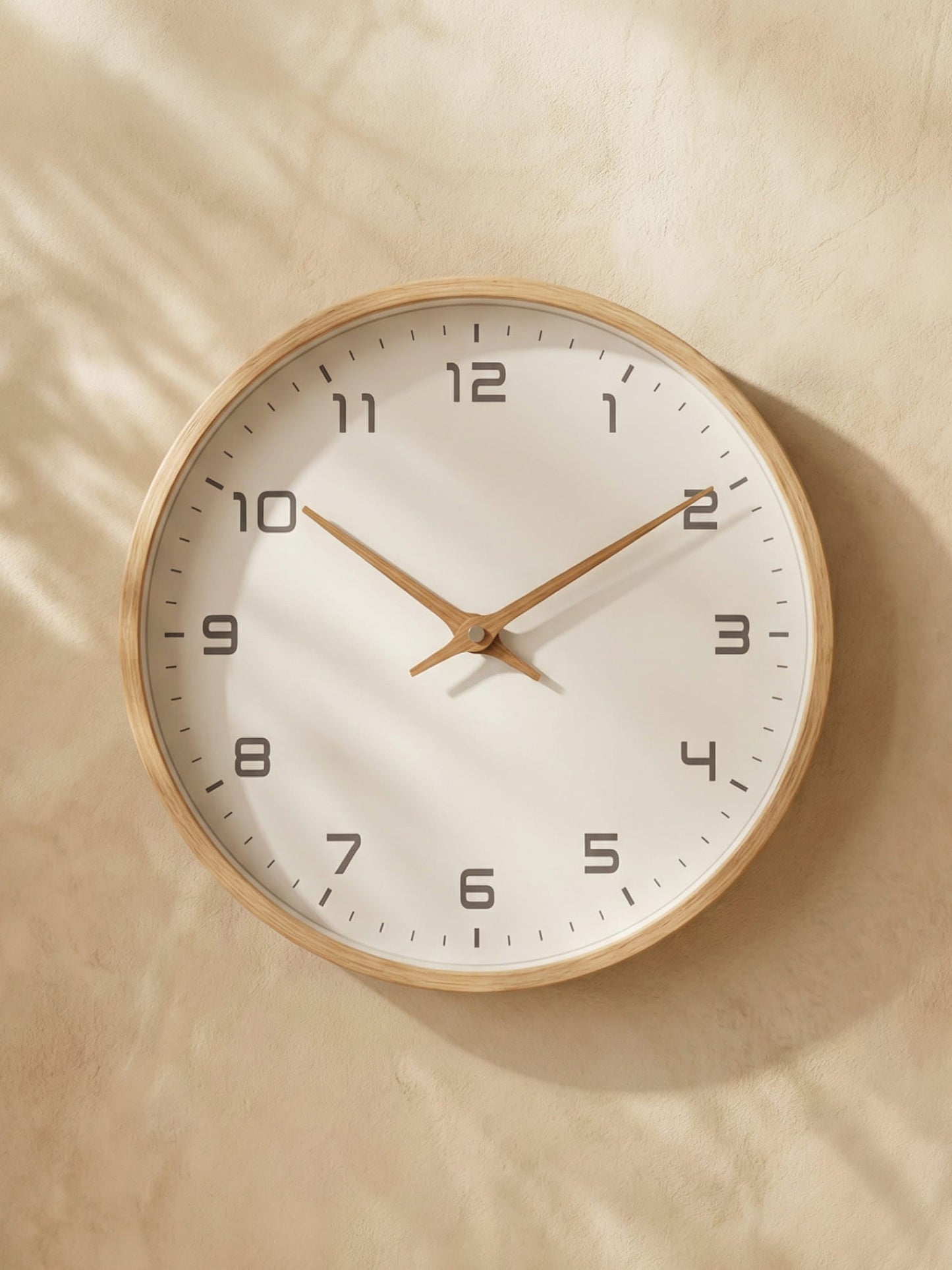 Stylish wooden wall clock, natural wood finish, perfect for modern home or office decor.