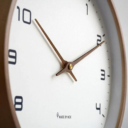 Modern wooden wall clock, versatile for home & office decor, features a minimalist natural wood design.