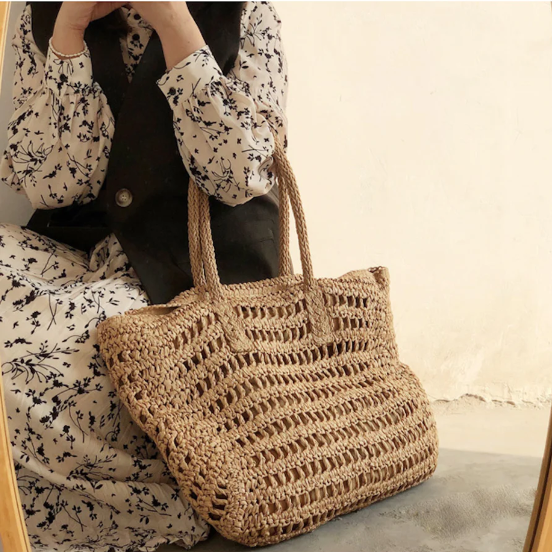 Sophisticated woven design tote handbag for women, perfect for an elegant warm-weather look.