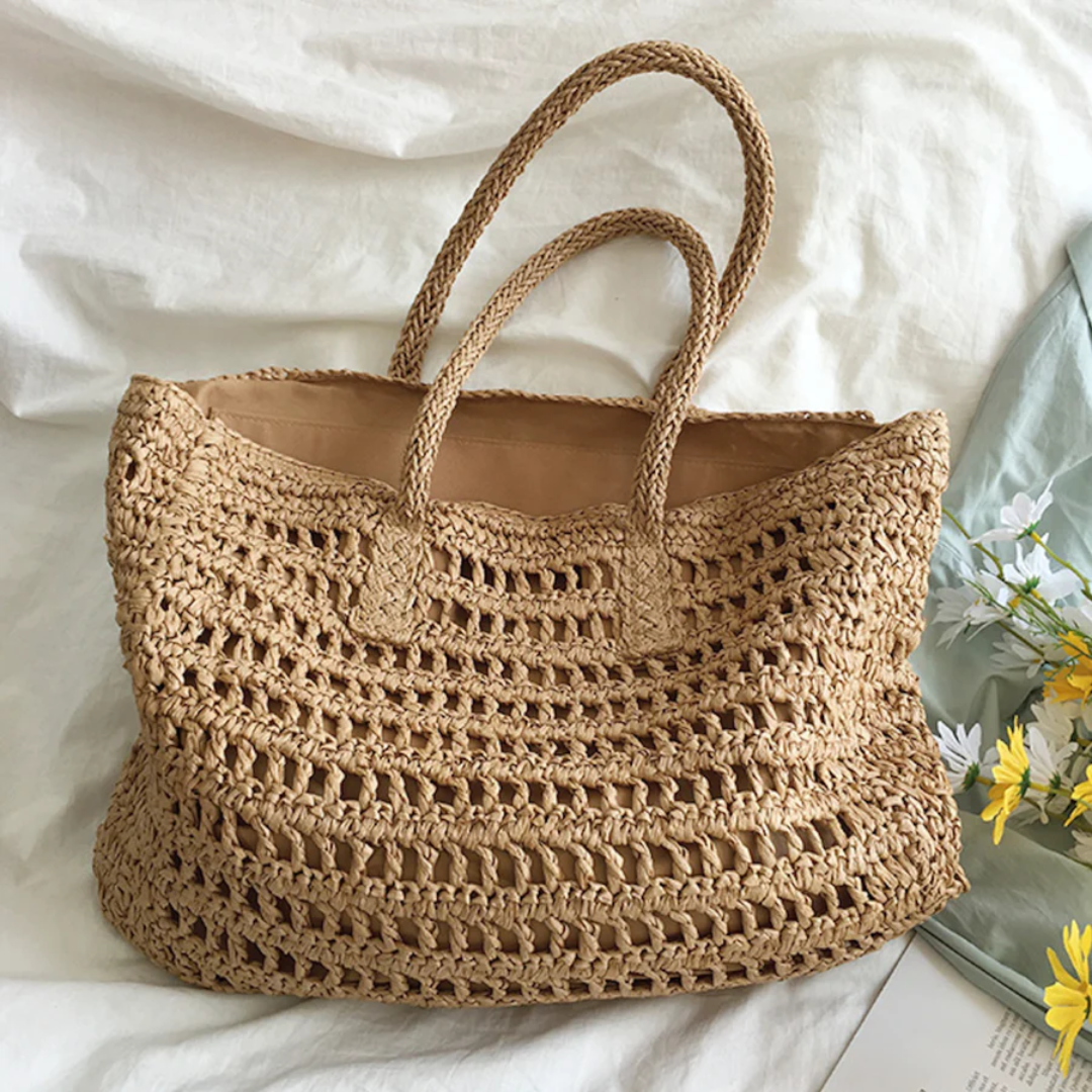 Fashionable women's woven tote handbag, your essential summer shoulder companion for travel.