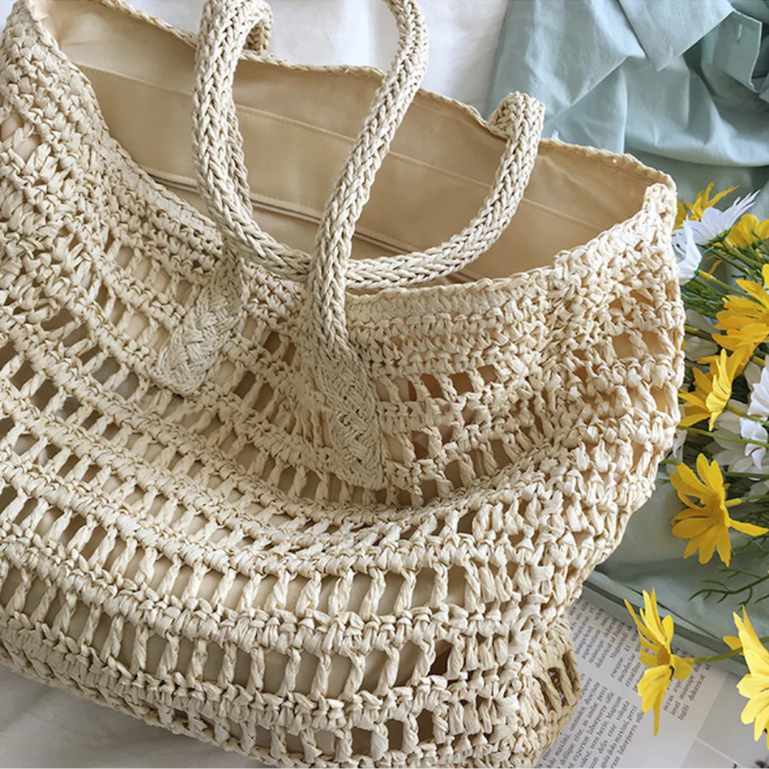 Large capacity woven beach tote bag for women, ideal for holidays & carrying essentials.
