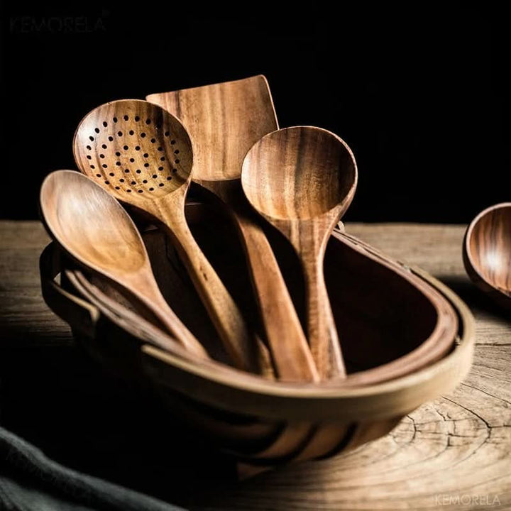 Handcrafted teak wood kitchen utensil set. Sustainable spatula, spoon, and turner for a natural cooking experience.