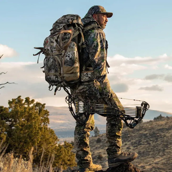 Durable tactical backpack, camo pattern, multiple pockets for organized outdoor gear