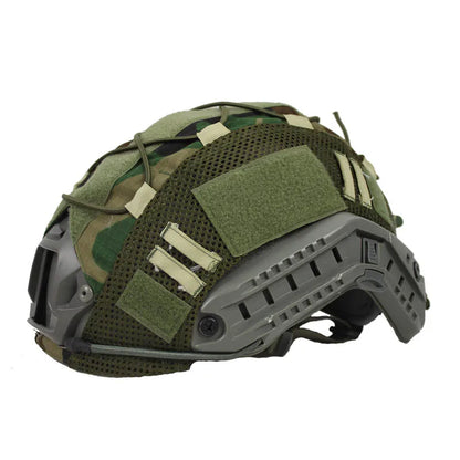 Tactical helmet cover with loop panels for patches, fitting FAST helmets, used in airsoft and tactical scenarios