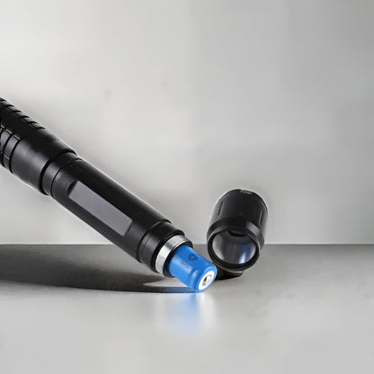 Rugged tactical laser torch, indispensable outdoor gear for survivalists and adventurers.