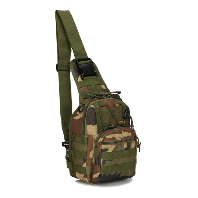Empty black tactical military grade outdoor sling backpack, showcasing its interior lining and pockets.