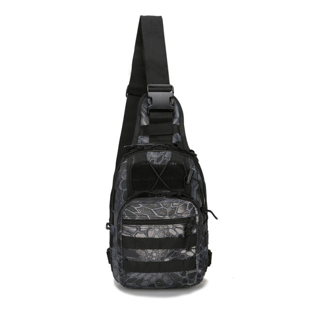 Detailed view of the zippers and pulls on a black tactical sling bag, built for durability.