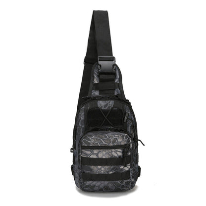 Detailed view of the zippers and pulls on a black tactical sling bag, built for durability.